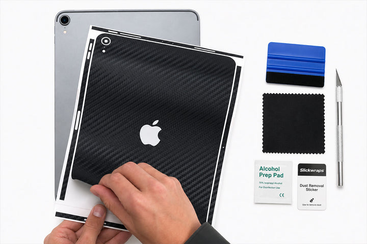Applying a precision-cut skin to a tablet