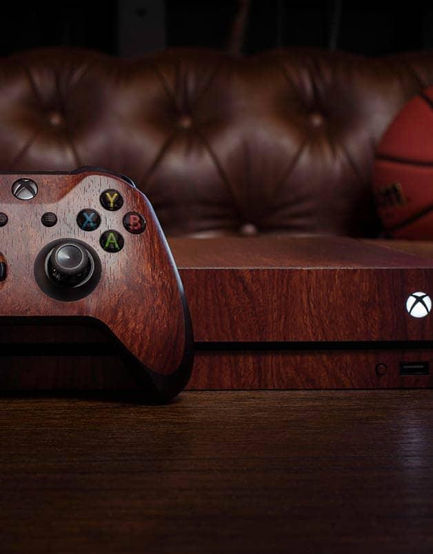 Gaming console customized with a protective Slickwraps skin