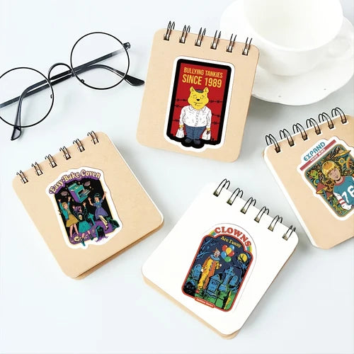 Decorative stickers applied to small notebooks