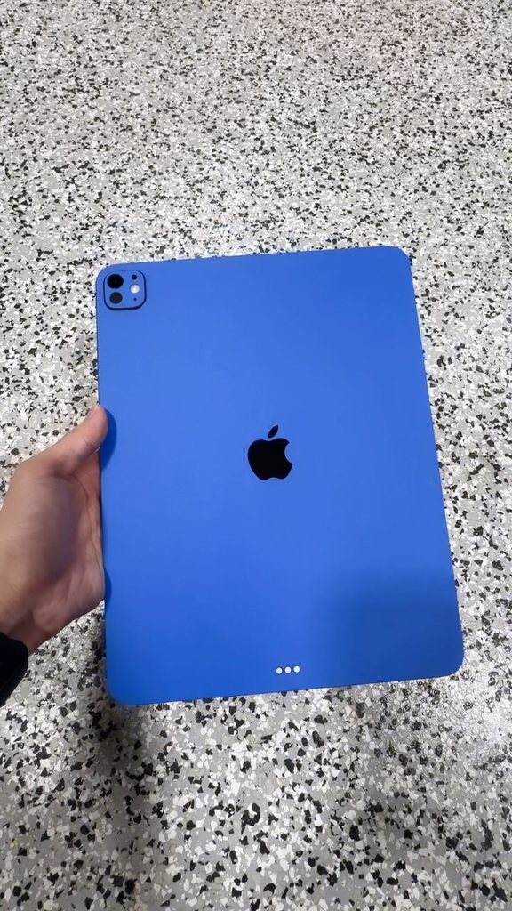 iPad Pro 13-inch M4 with a blue Slickwraps skin