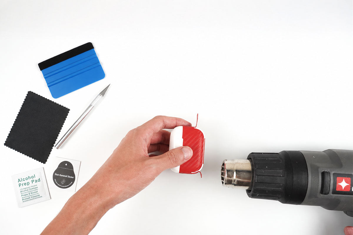 Applying a precision-cut skin to a wearable device